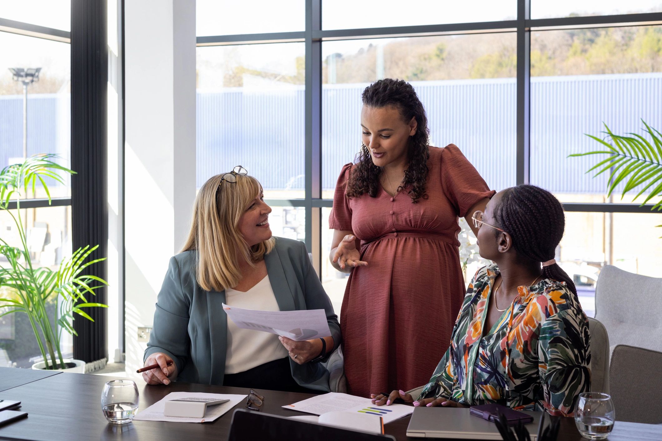 Business support team collaborating in a conference room